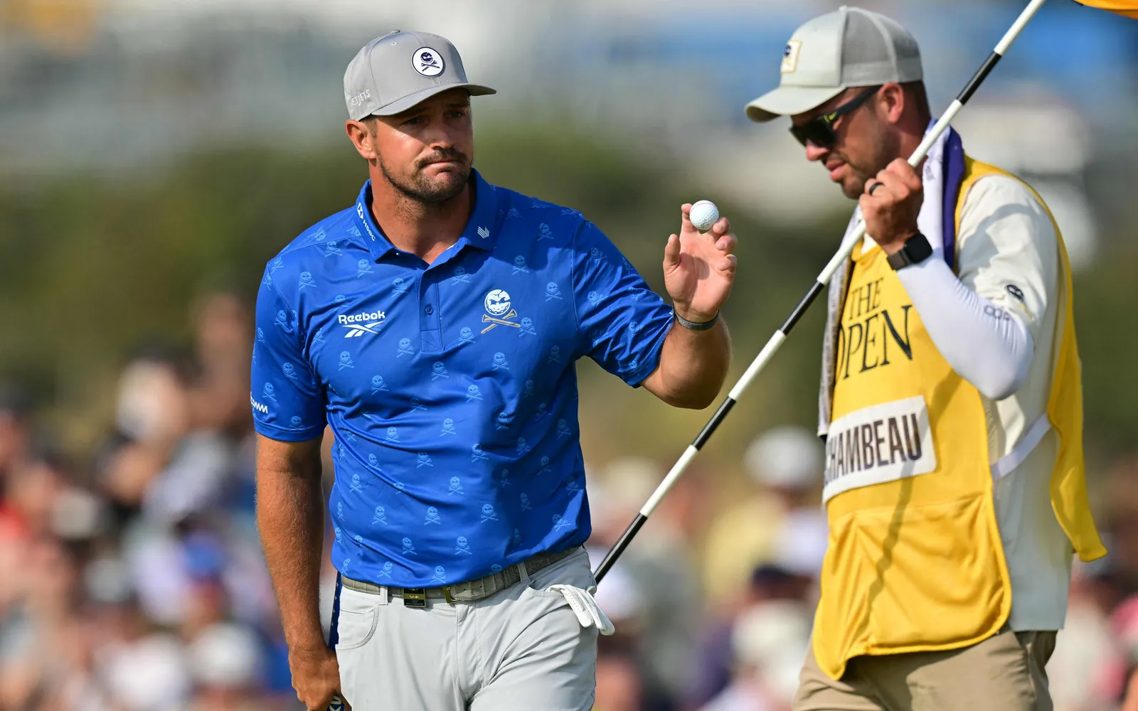 US golfer Bryson DeChambeau reacts to making his birdie putt on day two of the 154th Open Golf championship at Royal Birkdale Golf Club in north-west England on July 17, 2026. (Photo by ANDY BUCHANAN / AFP) / RESTRICTED TO EDITORIAL USE