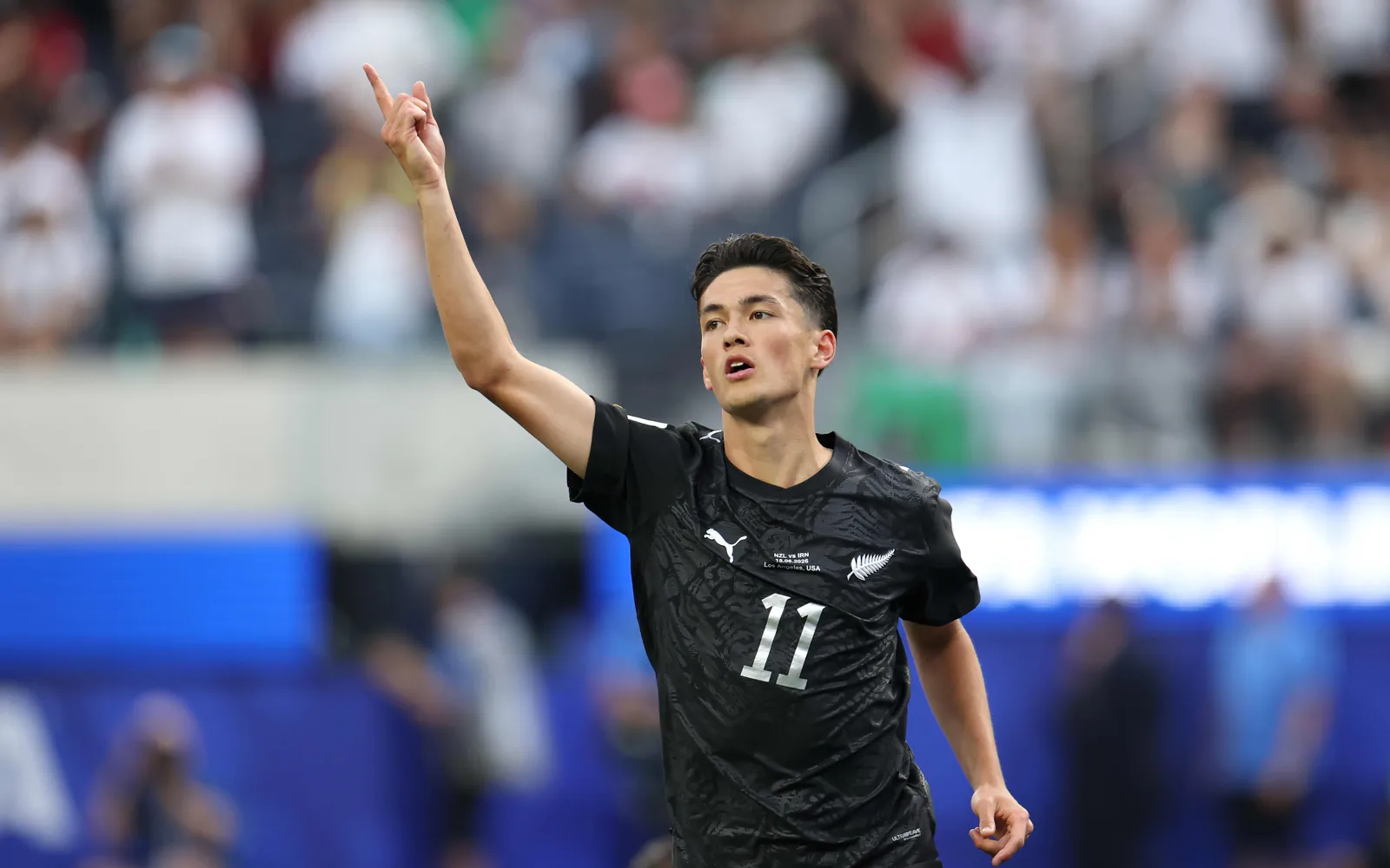 LOS ANGELES, CALIFORNIA - JUNE 15: Elijah Just #11 of New Zealand celebrates scoring his team's first goal during the FIFA World Cup 2026 Group G match between IR Iran and New Zealand at Los Angeles Stadium on June 15, 2026 in Los Angeles, California. (Photo by Harry How/Getty Images)